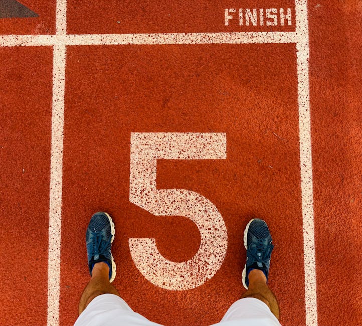 Running track finish line representing financial goals